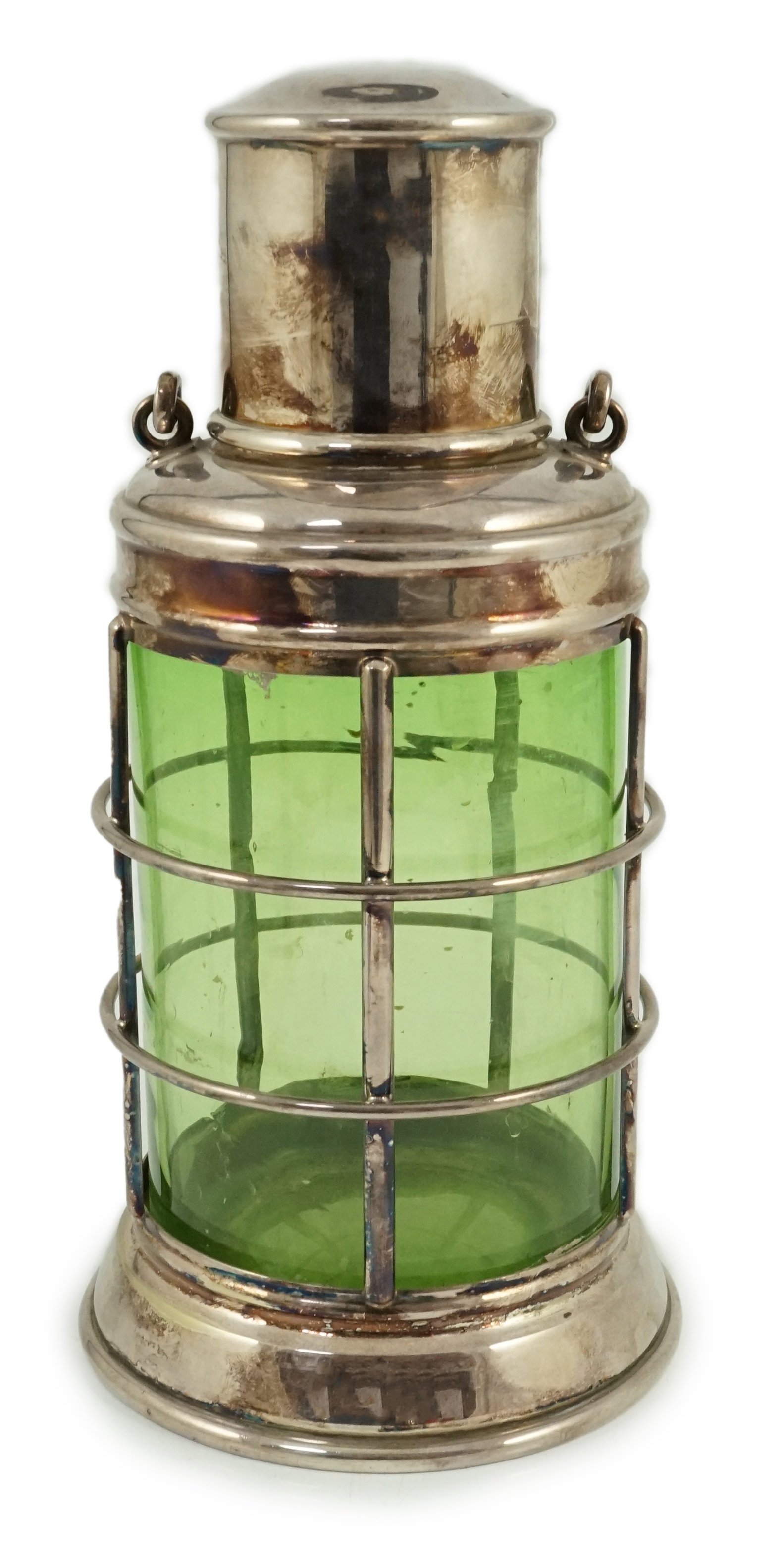 An Asprey & Co. silver plated and green glass novelty cocktail shaker in the form of a lantern